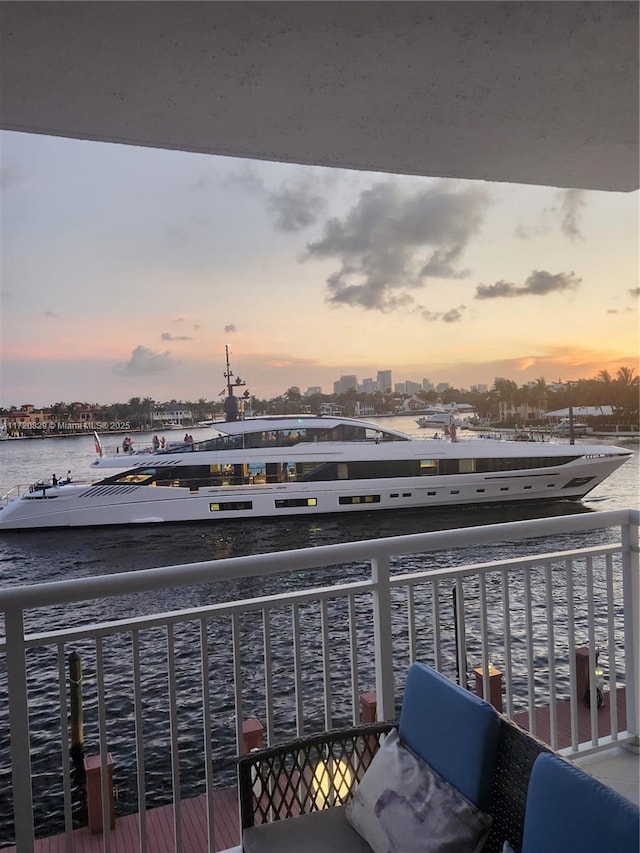 balcony at dusk with a water view