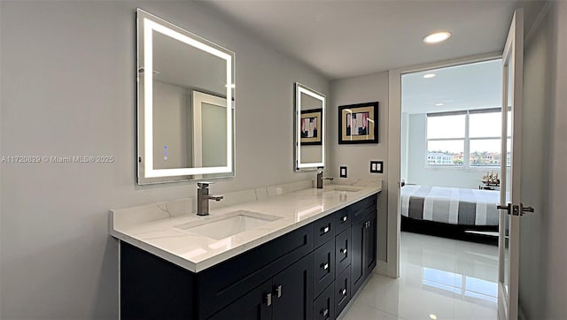 bathroom featuring tile patterned floors and vanity