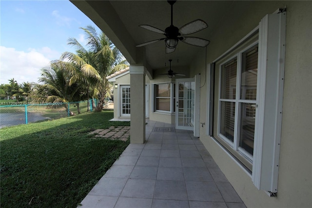 view of patio / terrace featuring ceiling fan