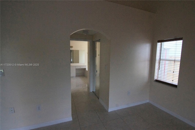 view of tiled spare room