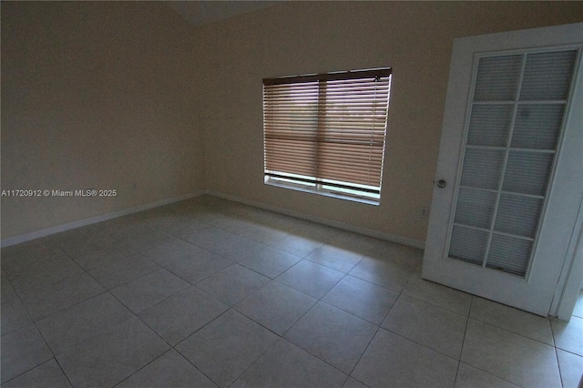 view of tiled spare room