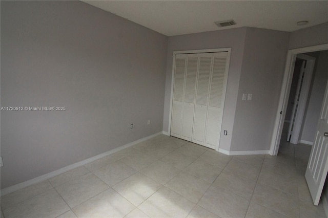 unfurnished bedroom featuring a closet