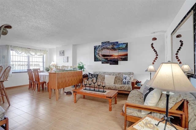 living room with a textured ceiling