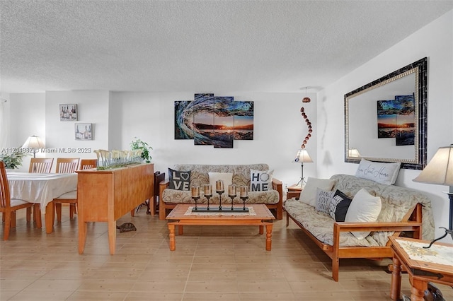 living room featuring a textured ceiling