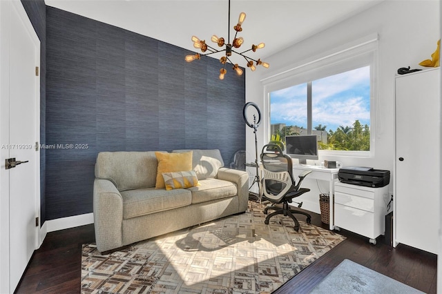 office area featuring dark hardwood / wood-style flooring and a chandelier