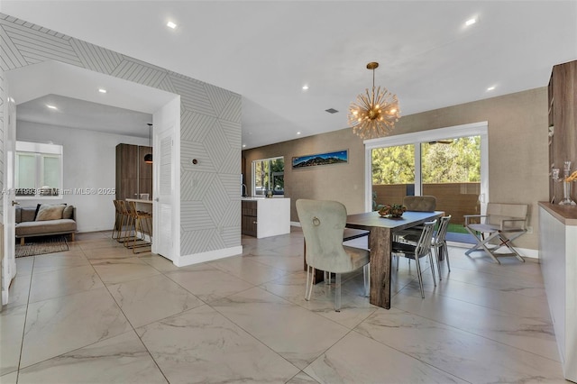 dining room featuring a notable chandelier