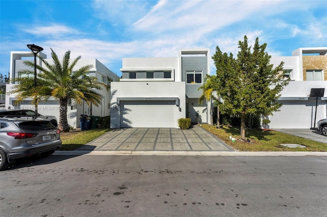 modern home featuring a garage