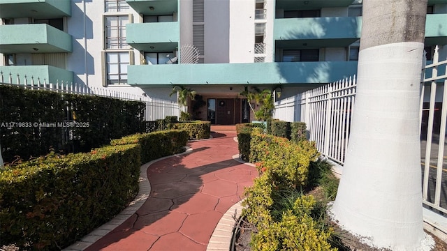 property entrance with a patio area