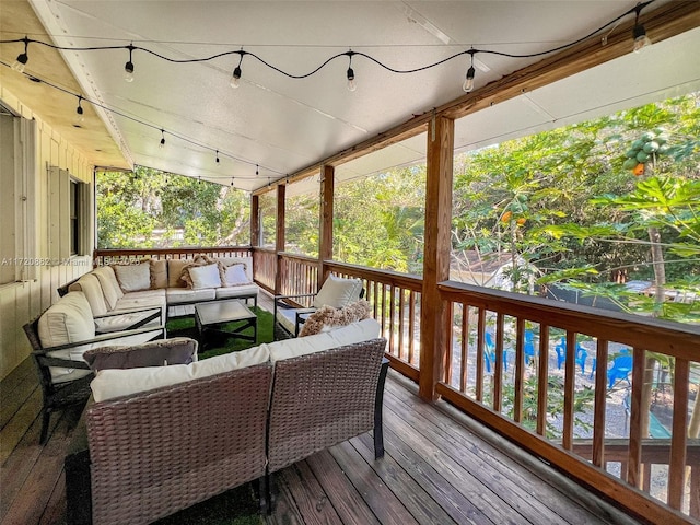 wooden deck featuring an outdoor hangout area