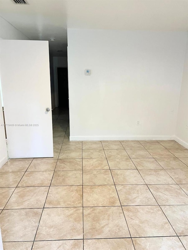 view of tiled spare room