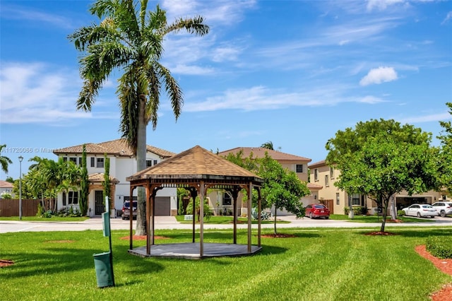 view of community with a gazebo and a lawn