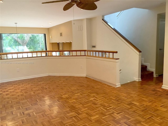 interior space featuring light parquet flooring and ceiling fan