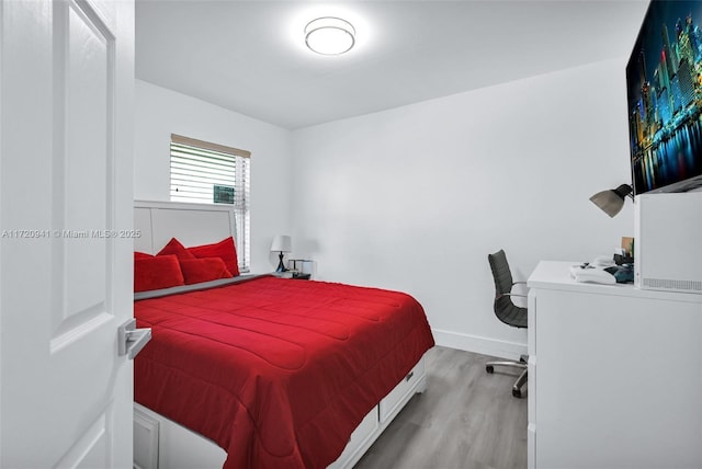 bedroom featuring light wood-type flooring