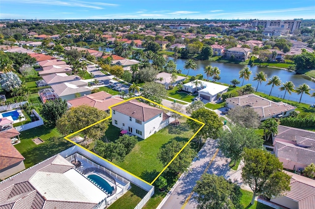 drone / aerial view with a water view