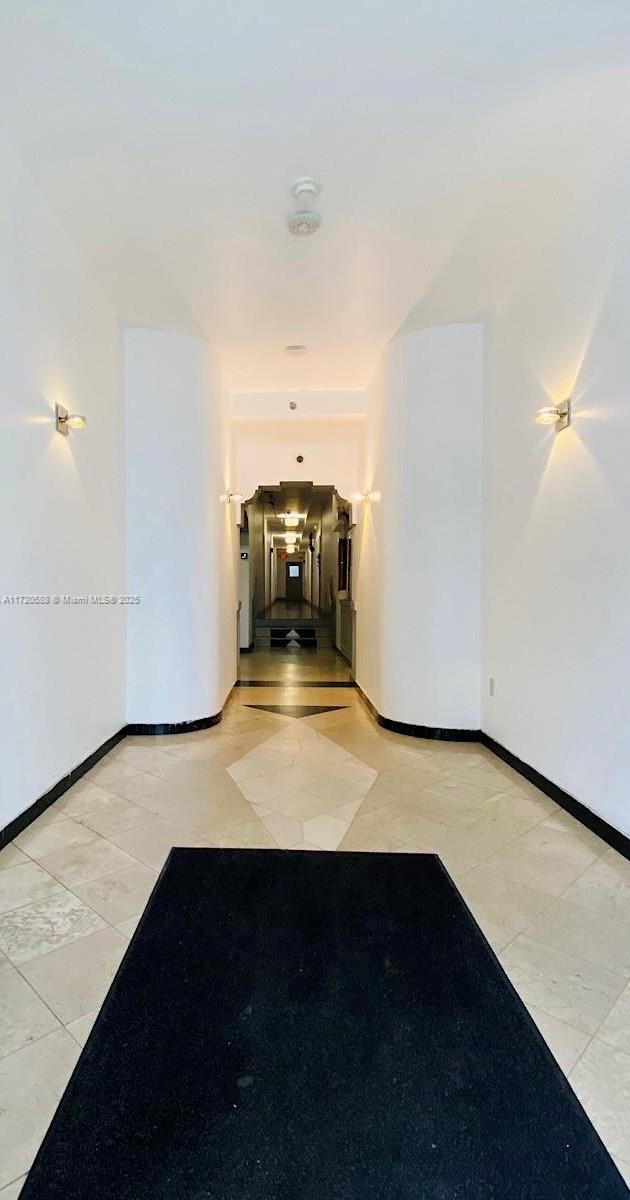 interior space featuring light tile patterned flooring