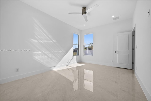 unfurnished living room with ceiling fan