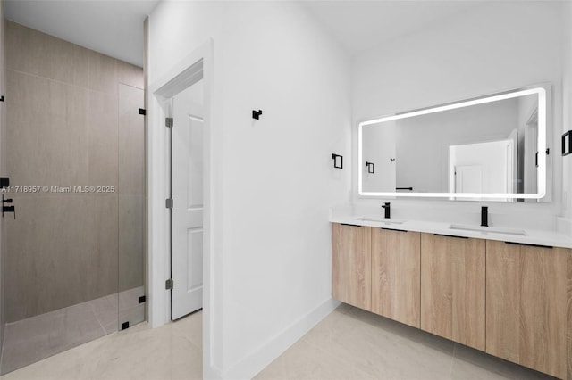 bathroom featuring tile patterned flooring, vanity, and an enclosed shower