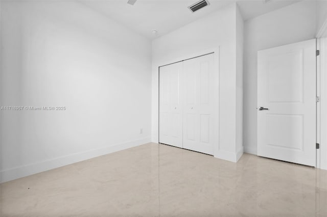 unfurnished bedroom featuring a closet