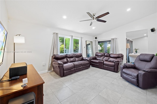 living room featuring french doors, ceiling fan, and lofted ceiling