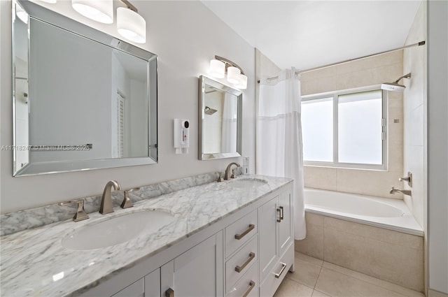 bathroom featuring tile patterned flooring, vanity, and shower / bath combo