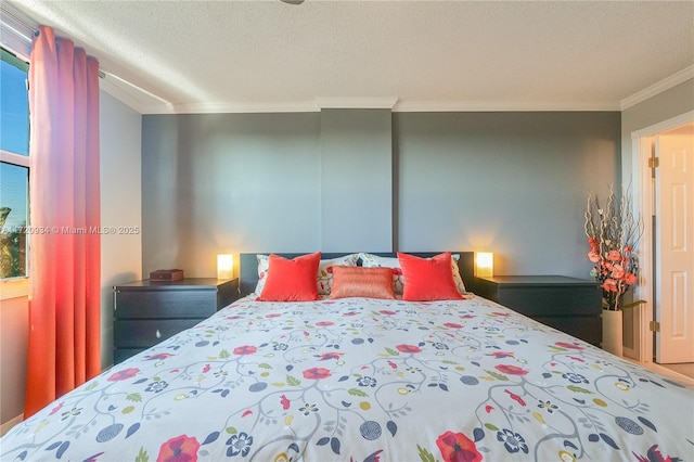 bedroom featuring a textured ceiling and ornamental molding