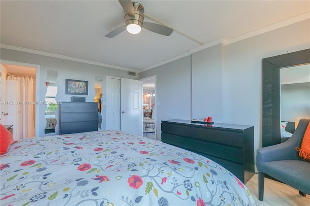 bedroom featuring ceiling fan and ornamental molding