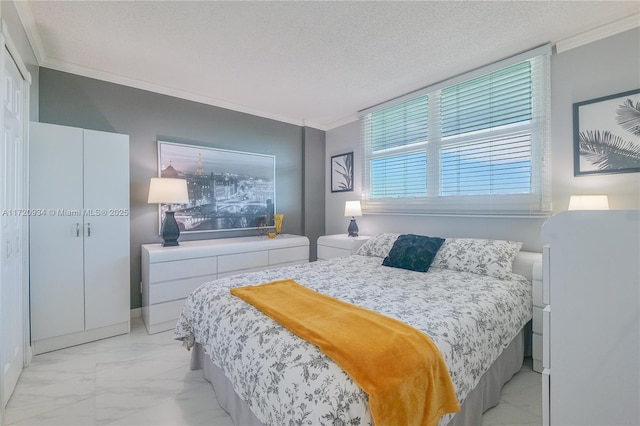 bedroom with a textured ceiling and ornamental molding