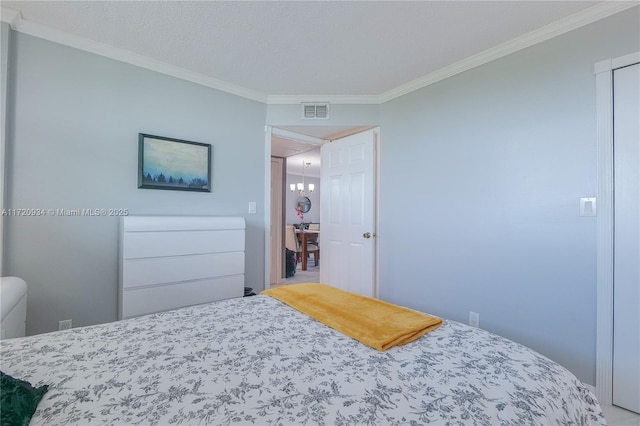 bedroom featuring crown molding