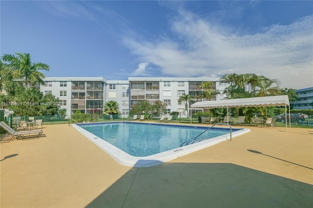 view of pool featuring a patio