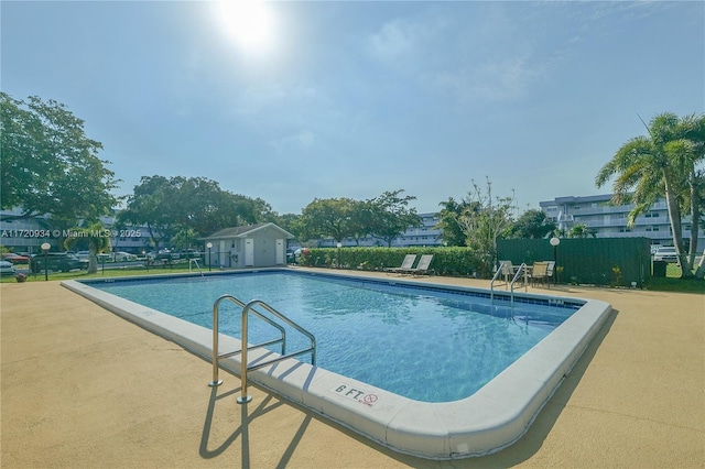 view of pool featuring a patio