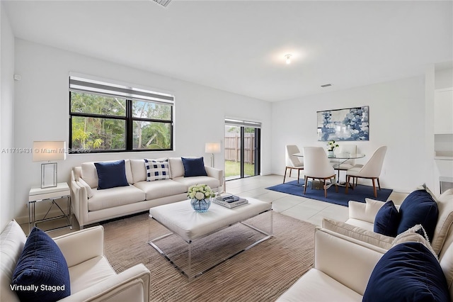 living room featuring light tile patterned floors