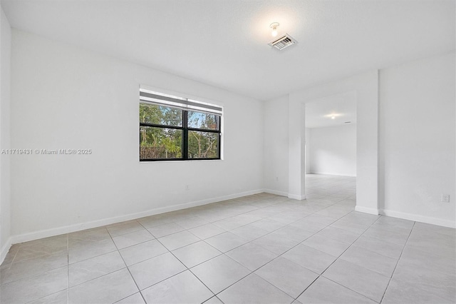 view of tiled spare room