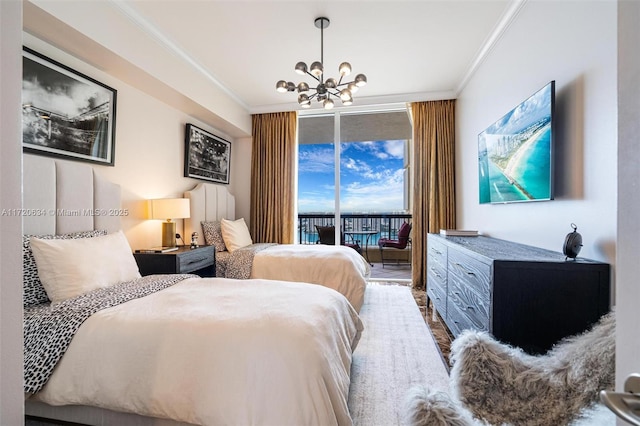 bedroom featuring floor to ceiling windows, ornamental molding, access to outside, and an inviting chandelier