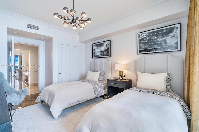 bedroom featuring visible vents, a closet, a chandelier, and crown molding