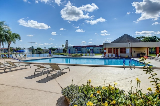 view of pool featuring a patio