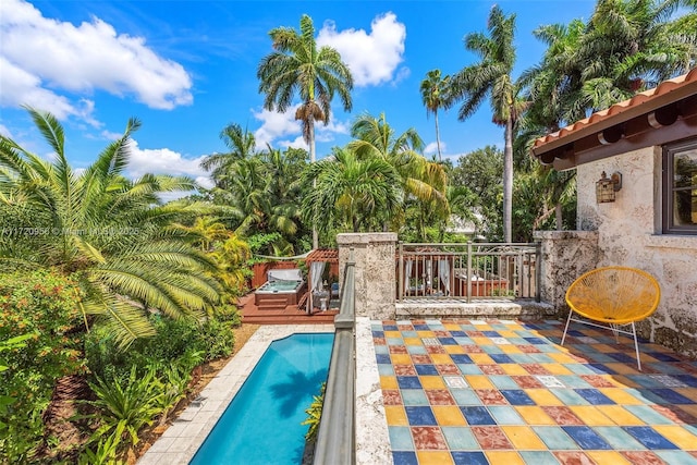 outdoor pool with a patio