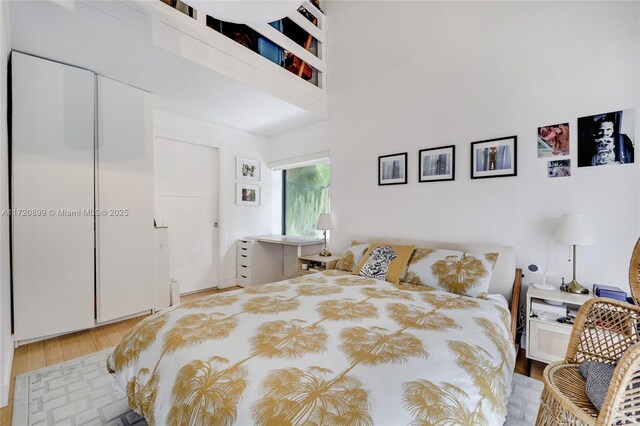 bedroom with light hardwood / wood-style flooring