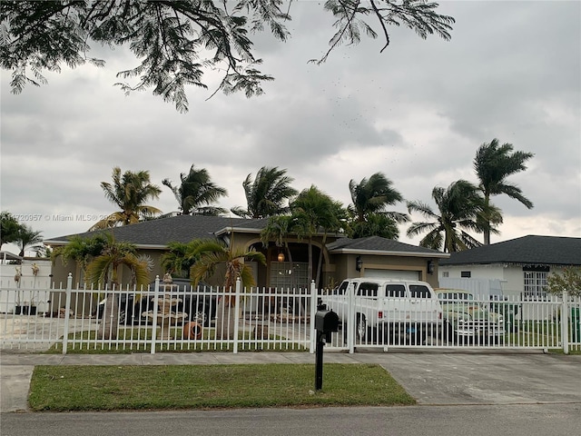 single story home featuring a garage