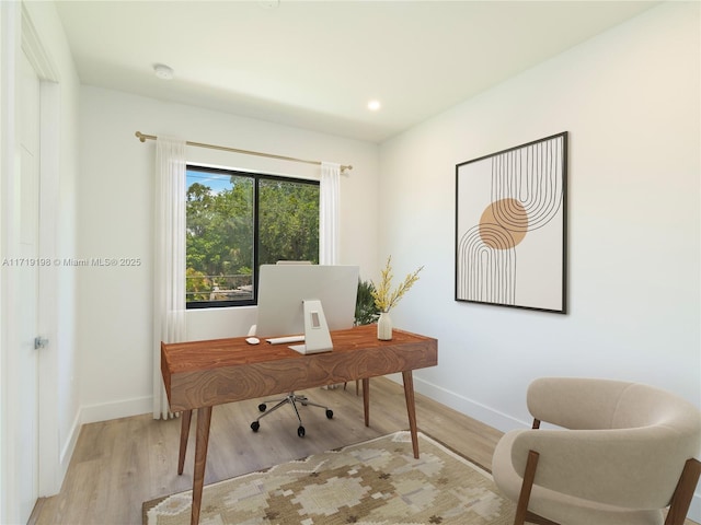 office area featuring light hardwood / wood-style floors