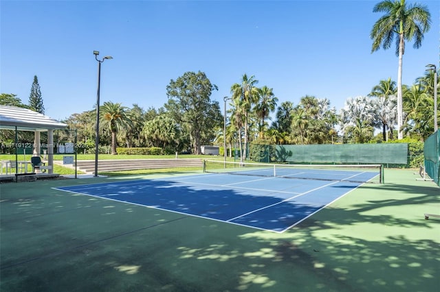 view of sport court featuring basketball court