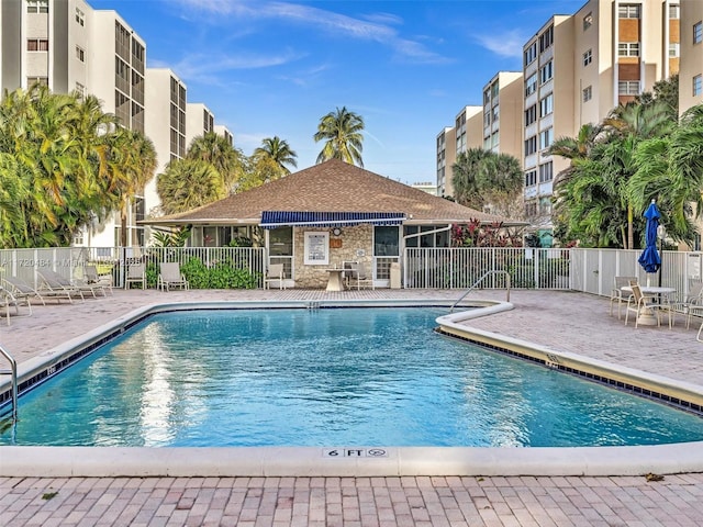 view of swimming pool with a patio