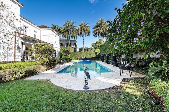 view of pool featuring a patio