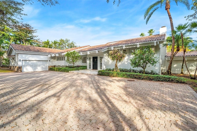 view of front of property featuring a garage