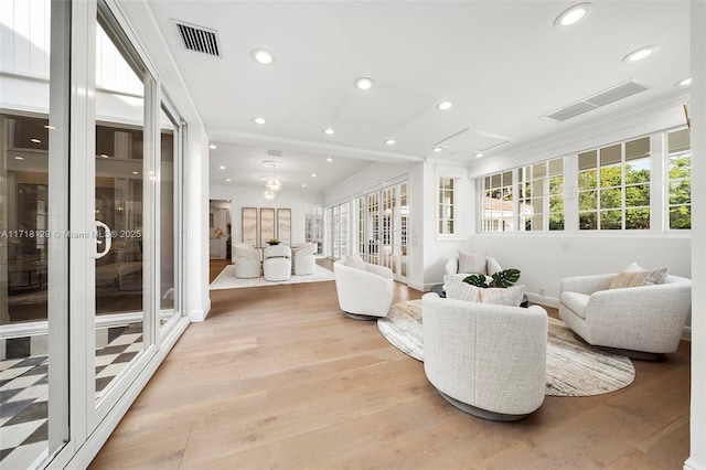 living room with light hardwood / wood-style flooring