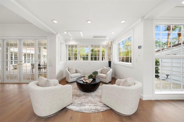 sunroom featuring french doors