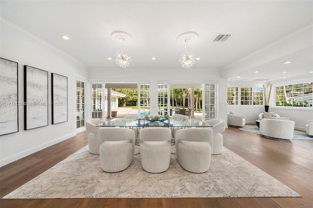 sunroom with a chandelier