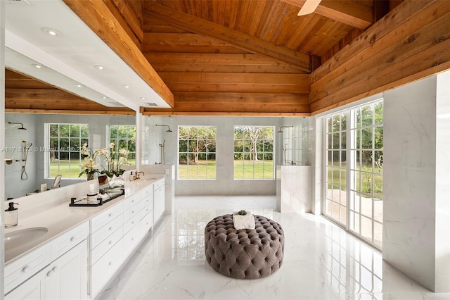 bathroom featuring vanity, a shower, high vaulted ceiling, wooden ceiling, and wood walls