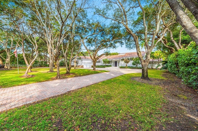 view of front of home with a front yard