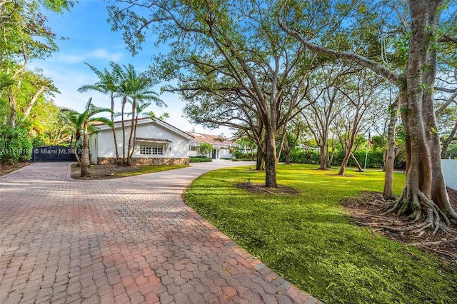 exterior space with a front lawn