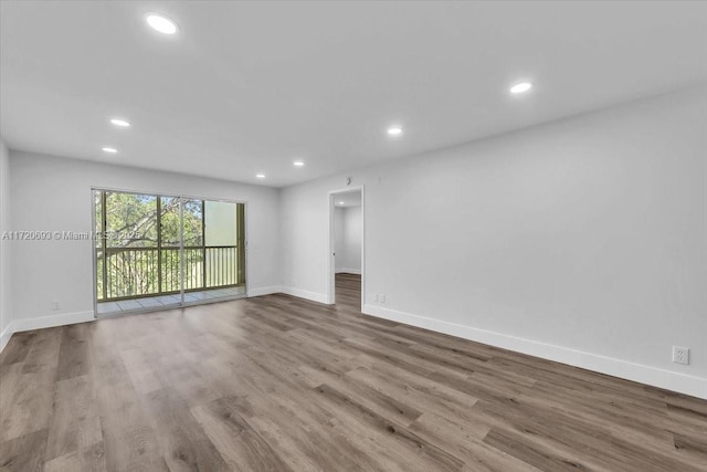 empty room featuring light hardwood / wood-style floors